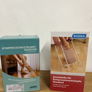 Palīgierīce  kompresijas zeķu uzvilkšanai.